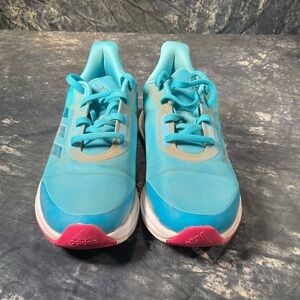 Adidas blue sneakers.